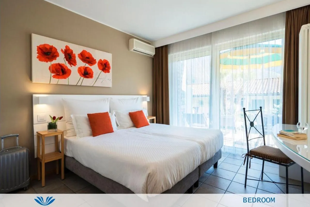 Отель Parco San Marco Lifestyle Beach Resort Порлецца